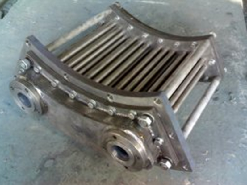 Titanium sector ring oil sump cooler